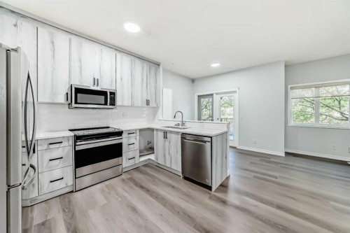 92 Simcoe Place Sw, Calgary, AB - Indoor Photo Showing Kitchen With Stainless Steel Kitchen With Upgraded Kitchen