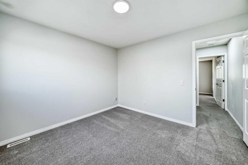 92 Simcoe Place Sw, Calgary, AB - Indoor Photo Showing Other Room
