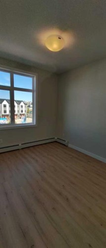 1304-200 Seton Circle Se, Calgary, AB - Indoor Photo Showing Other Room