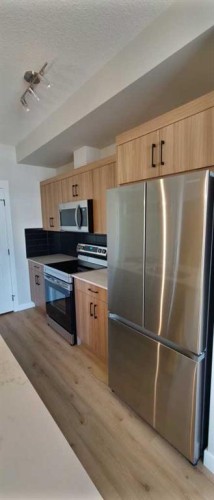 1304-200 Seton Circle Se, Calgary, AB - Indoor Photo Showing Kitchen