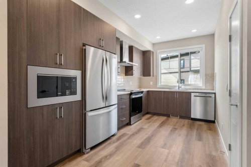 72-285 Chelsea Court, Chestermere, AB - Indoor Photo Showing Kitchen With Stainless Steel Kitchen