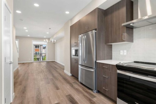 72-285 Chelsea Court, Chestermere, AB - Indoor Photo Showing Kitchen With Stainless Steel Kitchen With Upgraded Kitchen