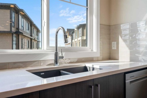 72-285 Chelsea Court, Chestermere, AB - Indoor Photo Showing Kitchen With Double Sink