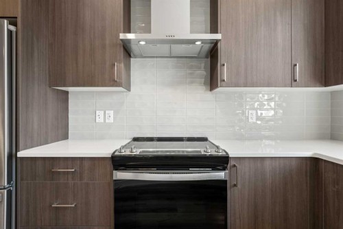 72-285 Chelsea Court, Chestermere, AB - Indoor Photo Showing Kitchen With Upgraded Kitchen