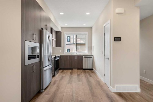72-285 Chelsea Court, Chestermere, AB - Indoor Photo Showing Kitchen With Stainless Steel Kitchen