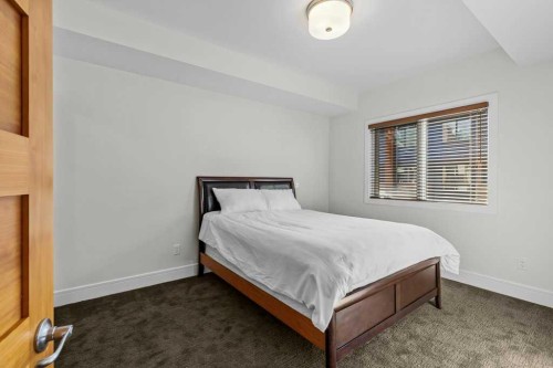 329-808 Spring Creek Drive, Canmore, AB - Indoor Photo Showing Bedroom