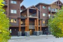 329-808 Spring Creek Drive, Canmore, AB  - Outdoor With Facade 