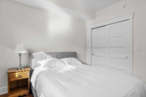 329-808 Spring Creek Drive, Canmore, AB - Indoor Photo Showing Bedroom