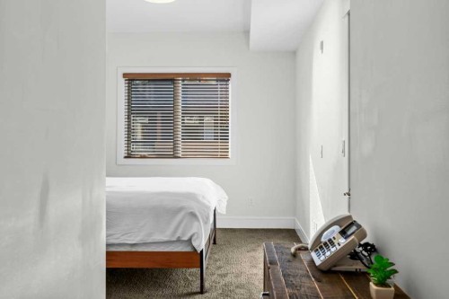 329-808 Spring Creek Drive, Canmore, AB - Indoor Photo Showing Bedroom