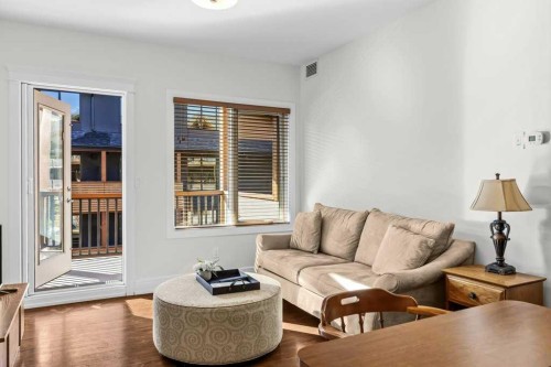 329-808 Spring Creek Drive, Canmore, AB - Indoor Photo Showing Living Room