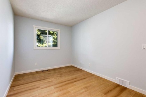 17 Sunvale Crescent Se, Calgary, AB - Indoor Photo Showing Other Room