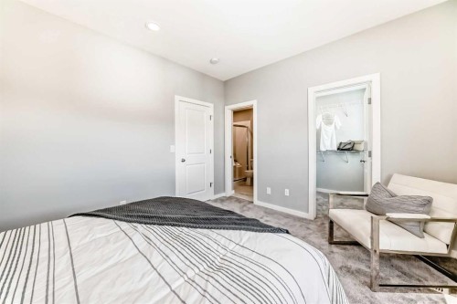 64 Bartlett Way Se, Calgary, AB - Indoor Photo Showing Bedroom