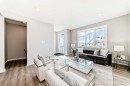 64 Bartlett Way Se, Calgary, AB  - Indoor Photo Showing Living Room 