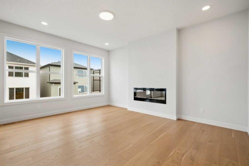 72 Amblefield Grove Nw, Calgary, AB - Indoor Photo Showing Living Room With Fireplace