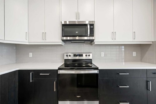 72 Amblefield Grove Nw, Calgary, AB - Indoor Photo Showing Kitchen With Upgraded Kitchen