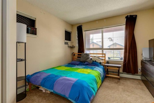 433-22 Richard Place Sw, Calgary, AB - Indoor Photo Showing Bedroom