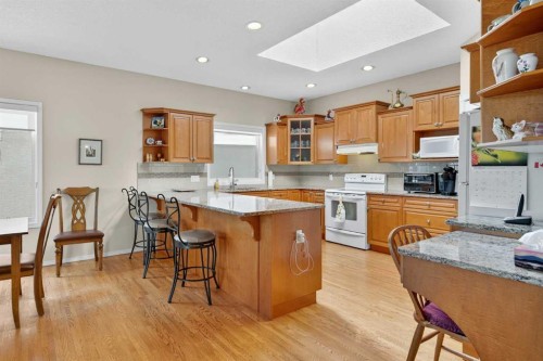 108 Hamptons Heights Nw, Calgary, AB - Indoor Photo Showing Other Room