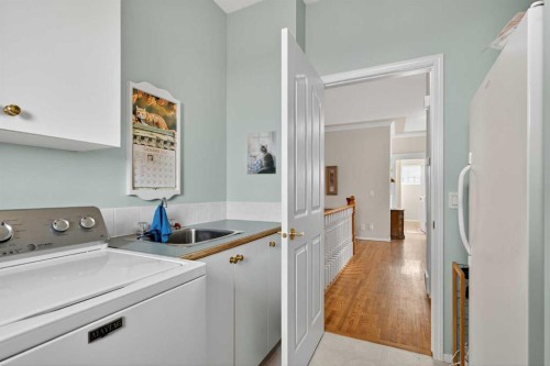 108 Hamptons Heights Nw, Calgary, AB - Indoor Photo Showing Laundry Room