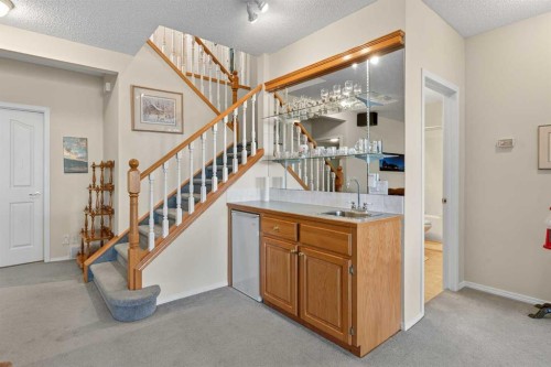 108 Hamptons Heights Nw, Calgary, AB - Indoor Photo Showing Other Room