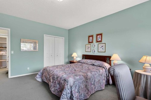 108 Hamptons Heights Nw, Calgary, AB - Indoor Photo Showing Bedroom