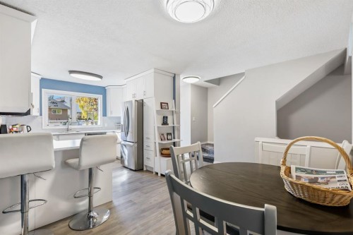 8-7 Westland Road, Okotoks, AB - Indoor Photo Showing Dining Room