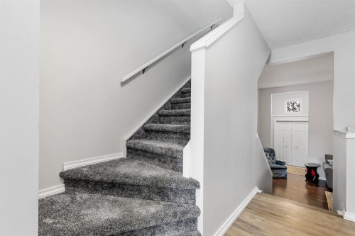 8-7 Westland Road, Okotoks, AB - Indoor Photo Showing Other Room