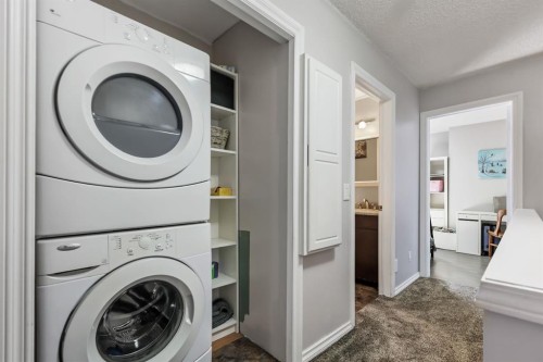 8-7 Westland Road, Okotoks, AB - Indoor Photo Showing Laundry Room