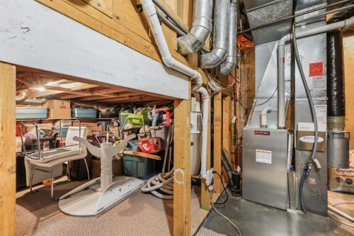 8-7 Westland Road, Okotoks, AB - Indoor Photo Showing Basement