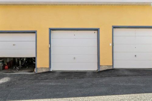 8-7 Westland Road, Okotoks, AB -  Photo Showing Garage