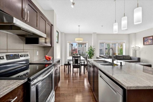 19 Sage Valley Close Nw, Calgary, AB - Indoor Photo Showing Kitchen With Stainless Steel Kitchen With Double Sink With Upgraded Kitchen