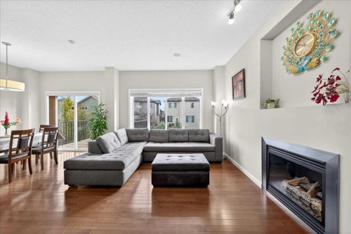 19 Sage Valley Close Nw, Calgary, AB - Indoor Photo Showing Living Room With Fireplace