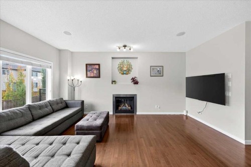 19 Sage Valley Close Nw, Calgary, AB - Indoor Photo Showing Living Room With Fireplace