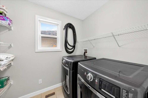 19 Sage Valley Close Nw, Calgary, AB - Indoor Photo Showing Laundry Room