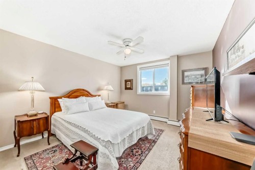 10D-80 Galbraith Drive Sw, Calgary, AB - Indoor Photo Showing Bedroom