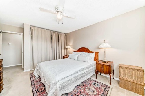 10D-80 Galbraith Drive Sw, Calgary, AB - Indoor Photo Showing Bedroom