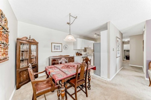 10D-80 Galbraith Drive Sw, Calgary, AB - Indoor Photo Showing Dining Room