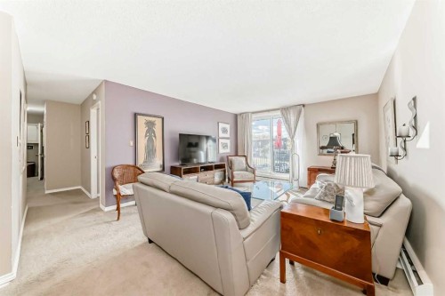 10D-80 Galbraith Drive Sw, Calgary, AB - Indoor Photo Showing Living Room