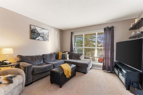 133 Auburn Bay View Se, Calgary, AB - Indoor Photo Showing Living Room