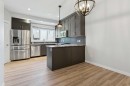 1-4513 Bowness Road Nw, Calgary, AB  - Indoor Photo Showing Kitchen With Stainless Steel Kitchen 