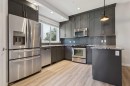 1-4513 Bowness Road Nw, Calgary, AB  - Indoor Photo Showing Kitchen With Stainless Steel Kitchen With Upgraded Kitchen 