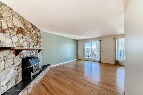 40 Glenpatrick Crescent, Cochrane, AB - Indoor With Fireplace