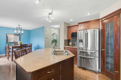 788 Luxstone Landing Sw, Airdrie, AB - Indoor Photo Showing Kitchen With Stainless Steel Kitchen With Double Sink
