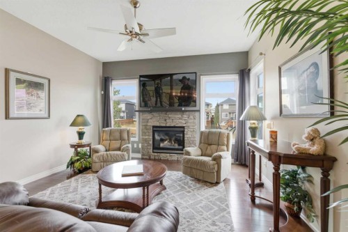 788 Luxstone Landing Sw, Airdrie, AB - Indoor Photo Showing Living Room With Fireplace
