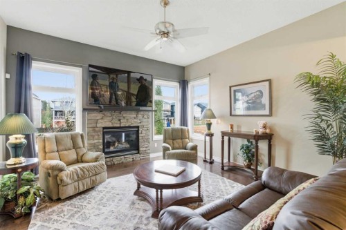 788 Luxstone Landing Sw, Airdrie, AB - Indoor Photo Showing Living Room With Fireplace