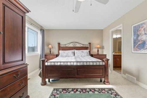788 Luxstone Landing Sw, Airdrie, AB - Indoor Photo Showing Bedroom