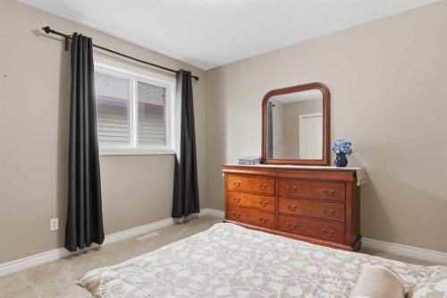 788 Luxstone Landing Sw, Airdrie, AB - Indoor Photo Showing Bedroom