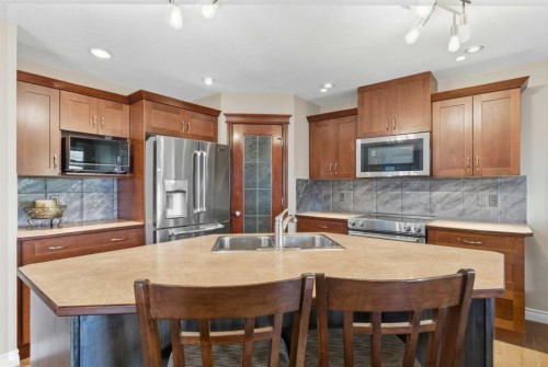 788 Luxstone Landing Sw, Airdrie, AB - Indoor Photo Showing Kitchen With Stainless Steel Kitchen