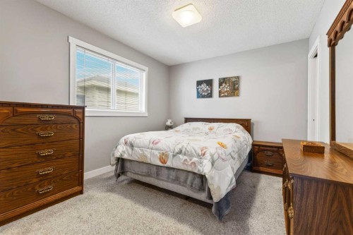 111 Edgebyne Crescent Nw, Calgary, AB - Indoor Photo Showing Bedroom