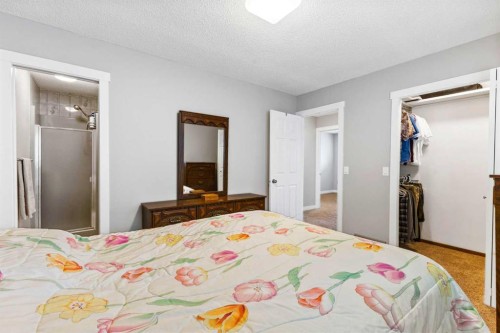 111 Edgebyne Crescent Nw, Calgary, AB - Indoor Photo Showing Bedroom