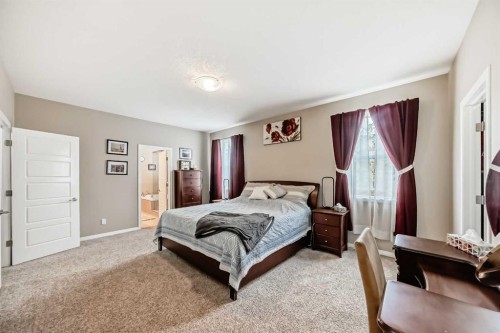 132 Waterlily Cove, Chestermere, AB - Indoor Photo Showing Bedroom